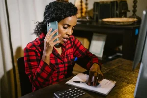 Bookkeeper charges Polokwane – business owner reviewing monthly bookkeeping reports